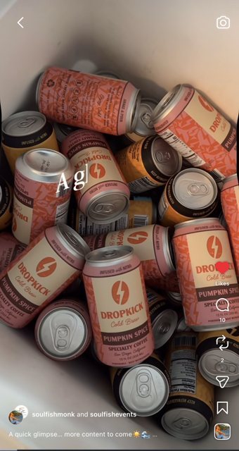 A cooler full of DropKick cans on ice at an event