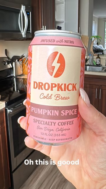Hand holding a Pumpkin Spice can: oh this is goood