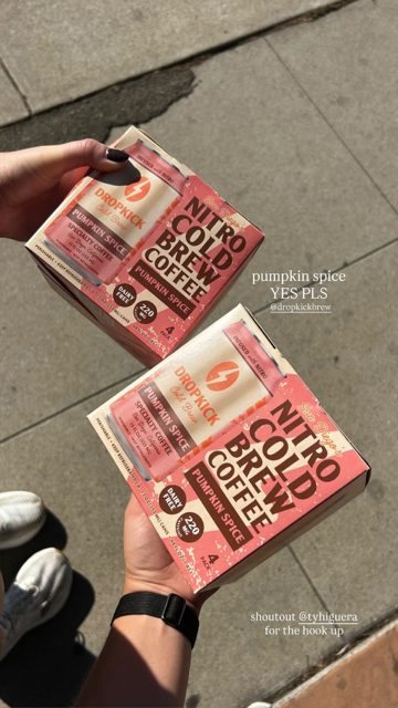 Two Pumpkin Spice 4-packs held up: pumpkin spice, yes pls